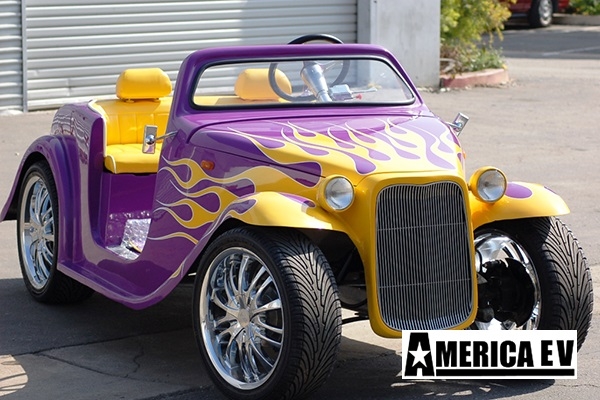 Purple California Roadster with Yellow Flames affordable golf cart rental, golf cart rent miami